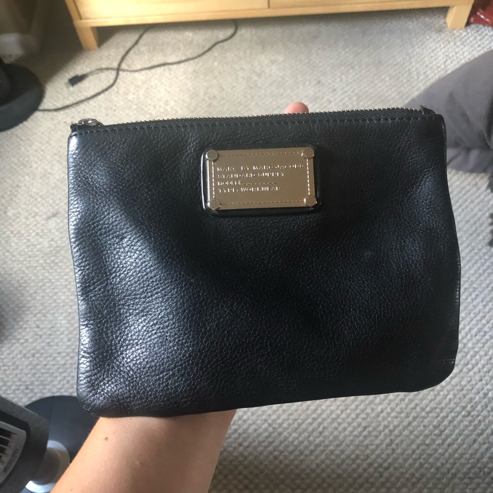 Oversized black pebbles leather wristlet